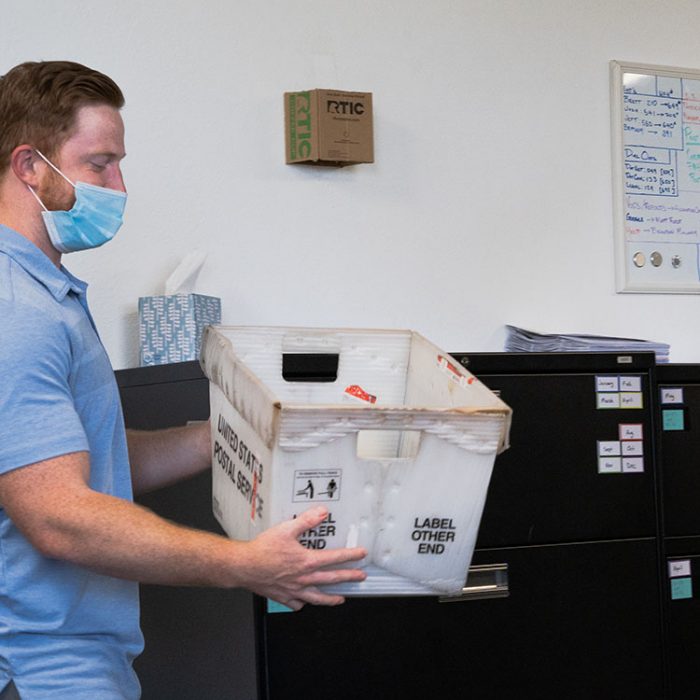 Registered agent processing mail in our Austin building.