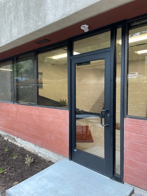 Side door entrance to the Lone Star Registered Agent building in Austin, TX.